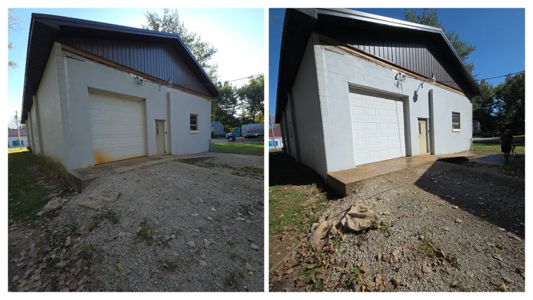 Before and after: the gable end of a block building with an overhead door, rust streaks and grime washed away