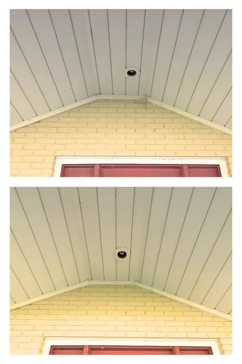 Before and after: the gable soffit above a front door, cleared of dust and staining