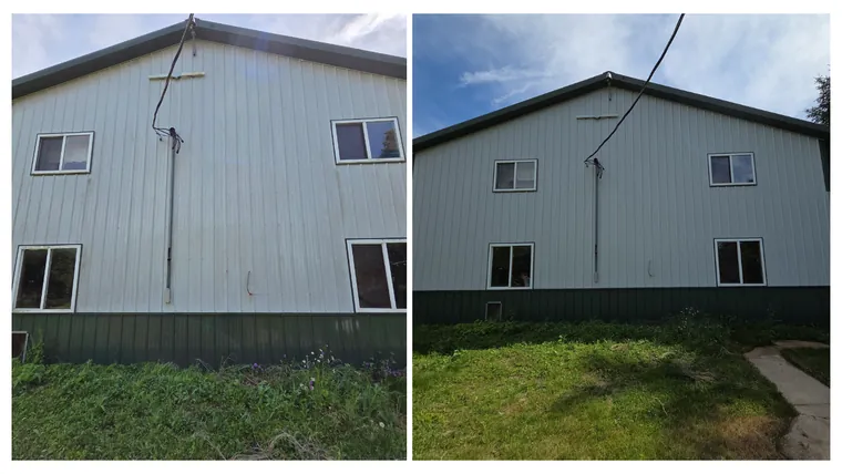 Before and after: the gable end of a white metal shop building washed clean