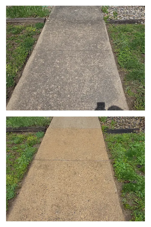 Before and after: a stained concrete sidewalk at a fire station, pressure washed clean