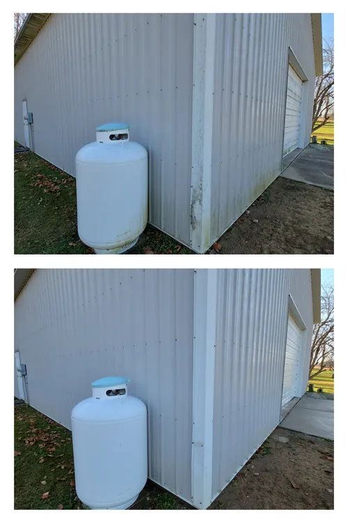 Before and after: the corner of a white metal garage wall behind a propane tank, washed clean