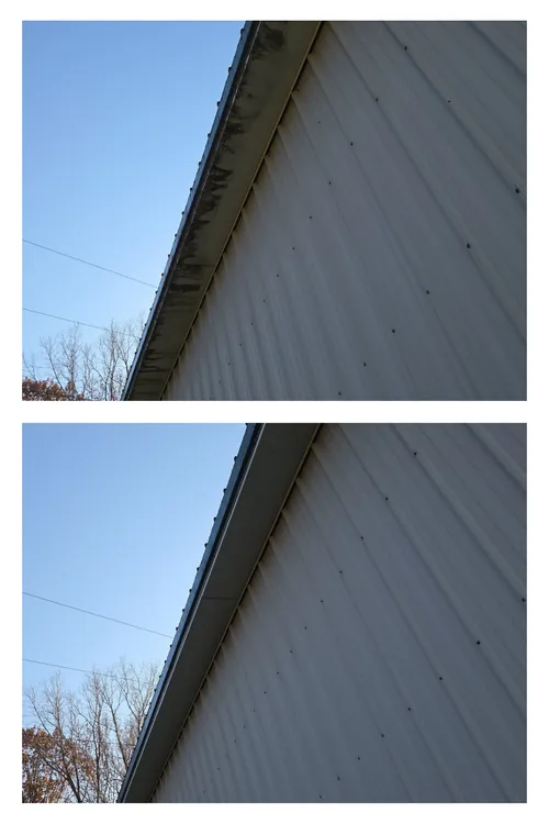 Before and after: the roofline and soffit of a long metal building, washed clean